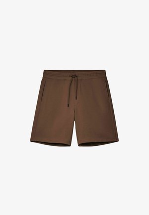 Brune shorts med snøre, elastisk talje og sidelommer, lavet af blødt stof.