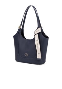 Borsa a spalla in eco-pelle blu navy con forma arrotondata, dettaglio del logo dorato e tracolla in tessuto staccabile con testo del marchio.