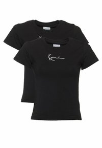 Black cotton T-shirt set, featuring short sleeves and a round neck. White script logo on the front. Smooth texture, classic fit.