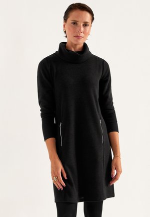 Stickad klänning - black