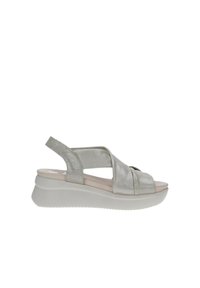 Sandali wedge in pelle silver con cinturini incrociati, design slingback e finitura texture. Suola leggera con un leggero disegno del battistrada.