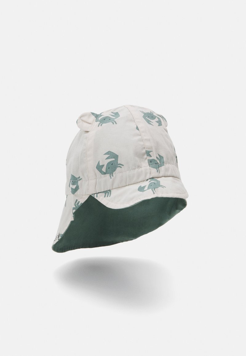 Bucket hat made of light fabric, featuring green crab patterns on a beige background, with a contrasting green underside and rounded top.