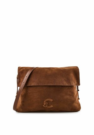 Brown suede crossbody bag with a flap closure and an embossed logo on the front, featuring an adjustable leather shoulder strap.
