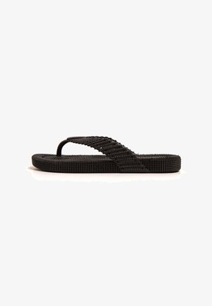 Schwarze Flip-Flops aus strukturiertem Gummi mit einem breiten, geflochtenen Riemen. Verfügt über eine flache Sohle mit erhabenen Punkten für besseren Halt. Entworfen für die Freizeit.