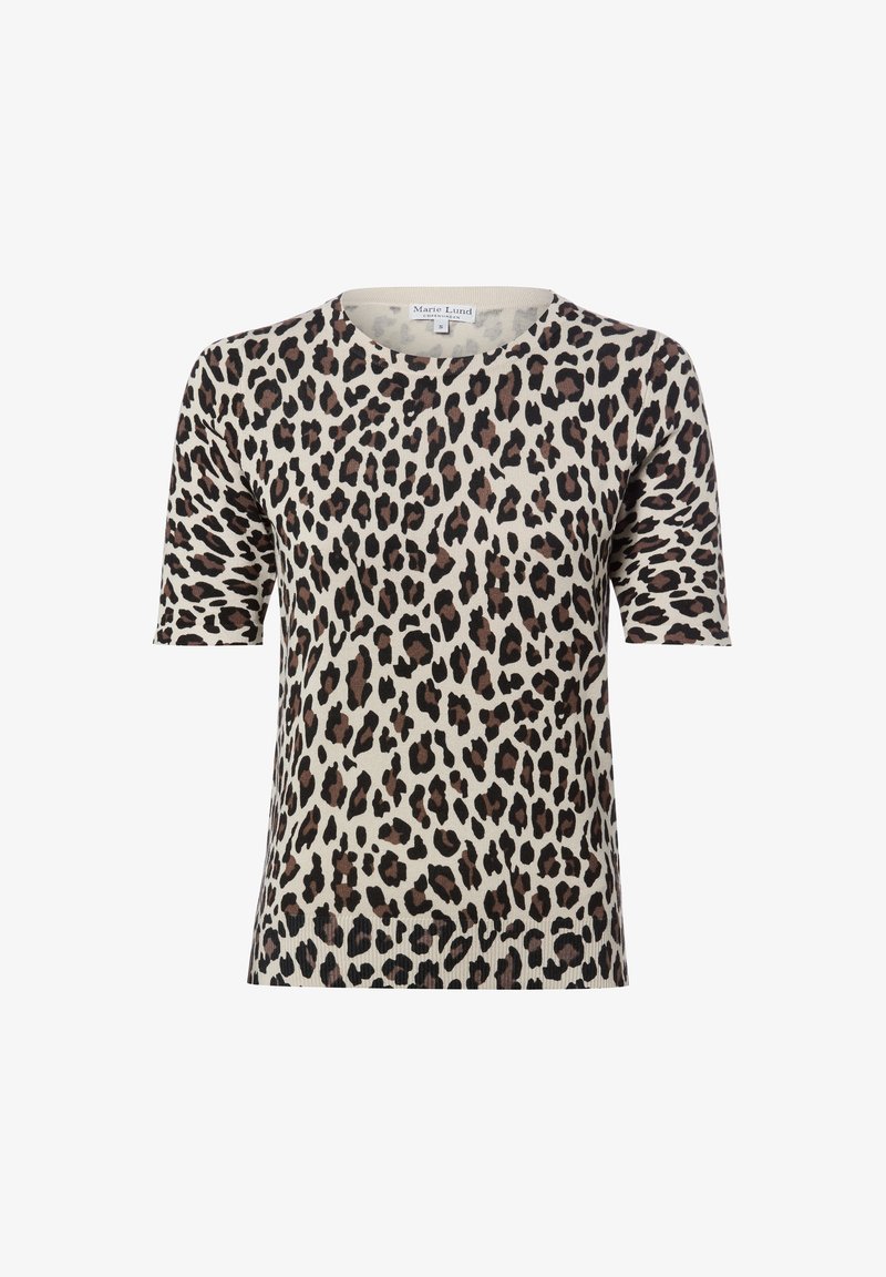 Haut pour femme à manches courtes avec un col rond et un fond beige, présentant un motif léopard irrégulier noir et marron.