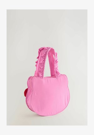 Pequeño bolso rosa en forma de cabeza de gato, con asas rizadas y cierre de cremallera, de pie sobre un fondo liso.