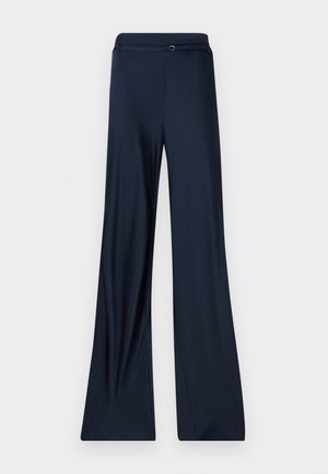 Navy wide-leg pants with smooth texture, featuring a flat waistband and a subtle metal accent at the front.