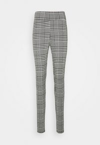 Pantaloni slim fit con motivo a scacchi houndstooth bianco e nero, vita alta e gamba dritta.