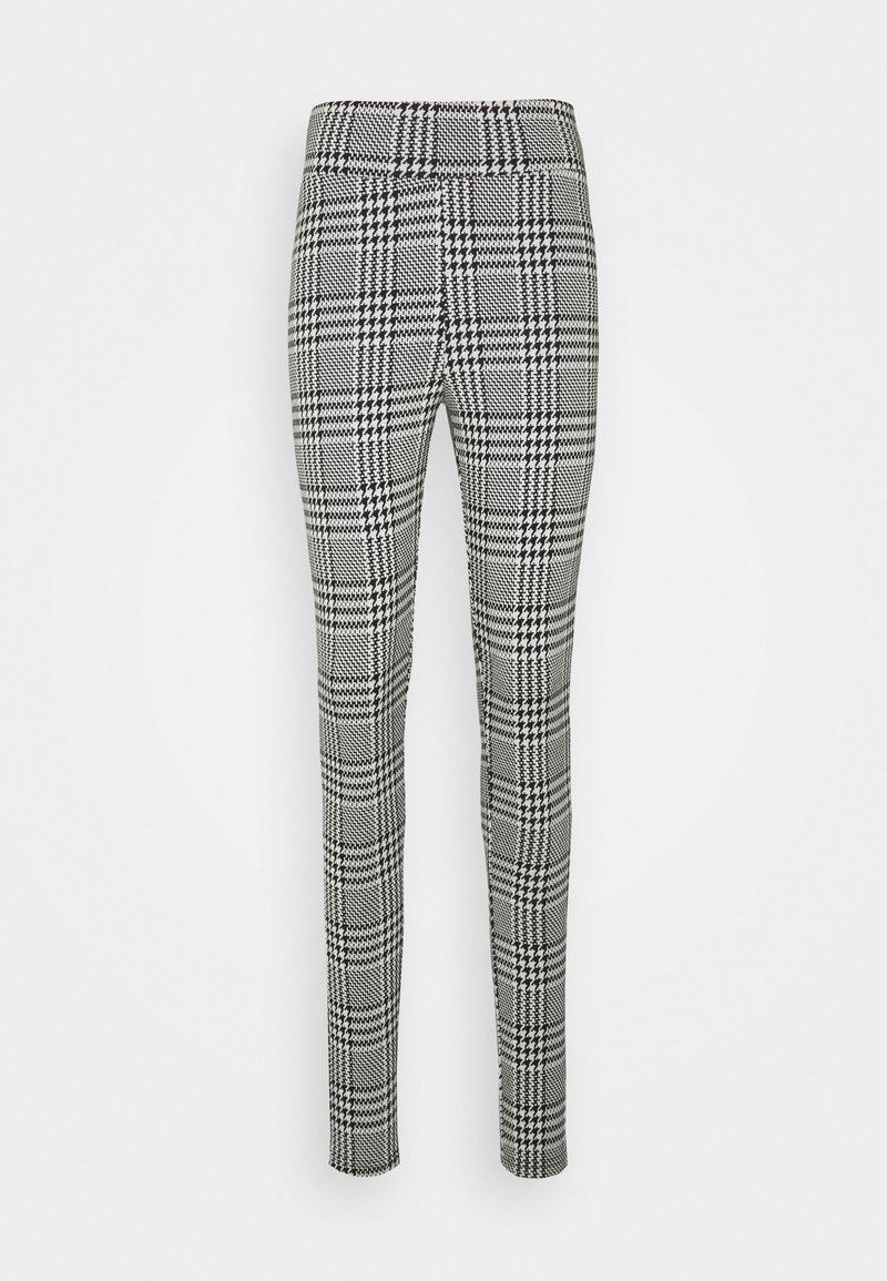Pantaloni slim fit con motivo a scacchi houndstooth bianco e nero, vita alta e gamba dritta.