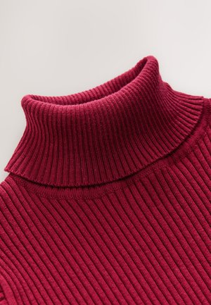 Maglione a collo alto a coste in rosso scuro. Presenta un colletto alto a doppio strato e una maglia lavorata a trama. Tessuto morbido con variazioni tonali.