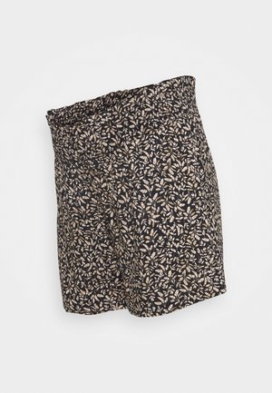 Black shorts featuring a leaf pattern in beige and cream. Elastic waistband; lightweight fabric with a smooth texture.