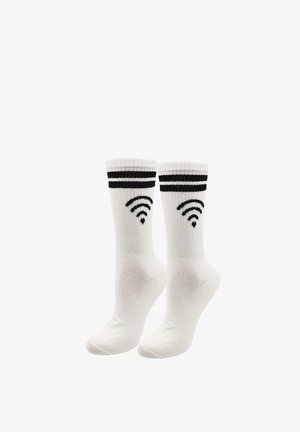 Białe bawełniane skarpetki z czarnymi prążkowanymi akcentami i grafiką sygnału Wi-Fi. Zaprojektowane dla wygody z wzmocnionym obszarem pięty i palców.
