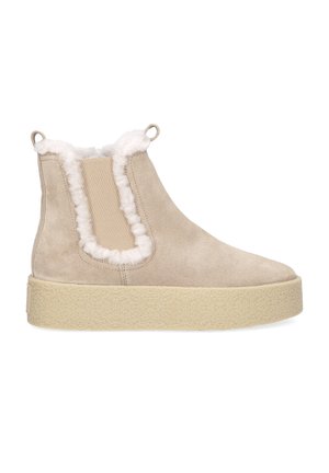 Beige Wildleder-Stiefelette mit einem weichen Kragen aus Fleece, elastischen Seitenpaneelen und einer strukturierten hellbraunen Sohle.