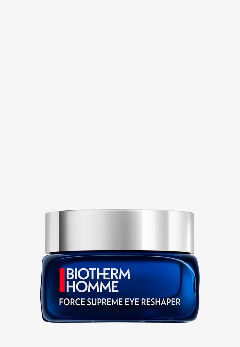 Pot bleu foncé de Biotherm Homme Force Supreme Eye Reshaper avec un couvercle argenté sur un fond blanc.