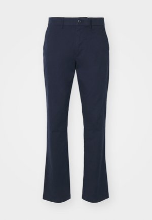 Navy blue trousers made from cotton blend fabric, featuring a straight leg design, standard waistband with a button closure, and side pockets.