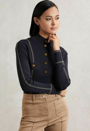 - Sweter
