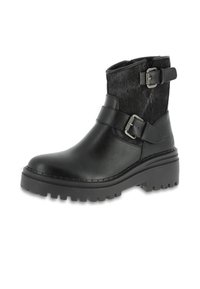 Botín negro hecho de cuero y tela, con dos hebillas, una suela gruesa y un acabado texturizado. Diseño de punta redonda.