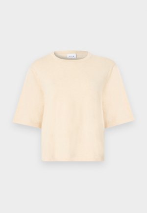 Beežist puuvillane t-särk lühikeste varrukatega, ümar kaelusega ja lõdva lõikega. Sile tekstuur, ilma mustrite või täiendavate detailideta.