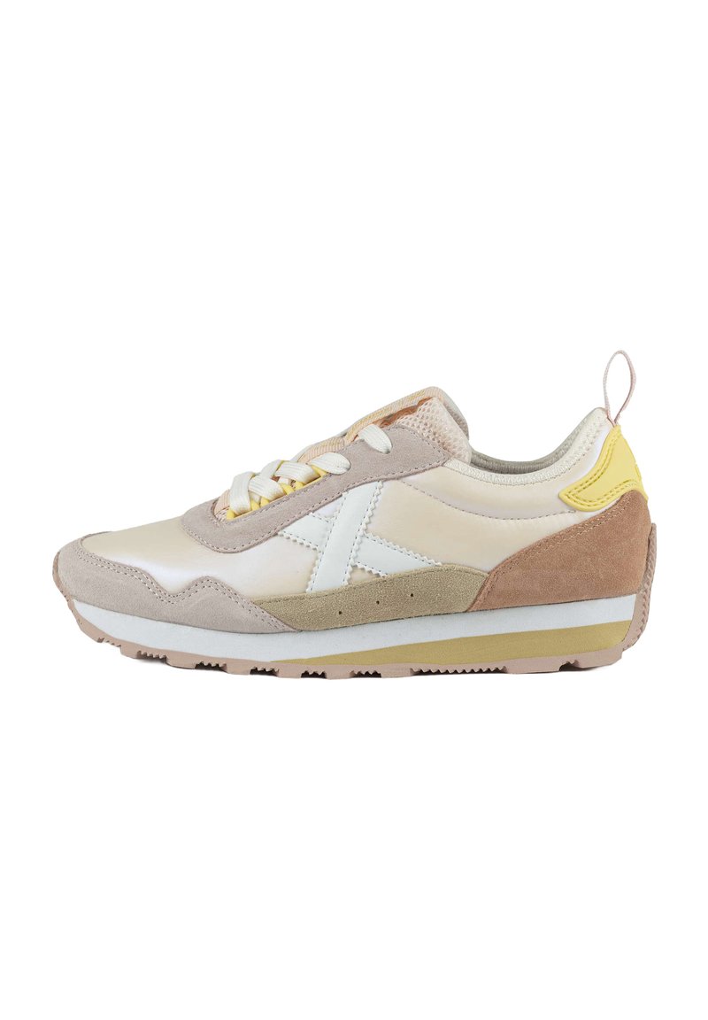 Sneaker with a combination of white leather, beige suede, and yellow accents. Features a textured design, lace closure, and rubber sole.