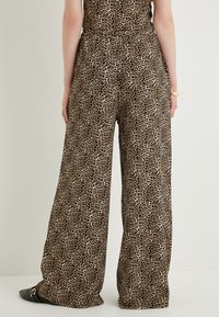 Koton LEOPARD PATTERNED - Bukser - black
