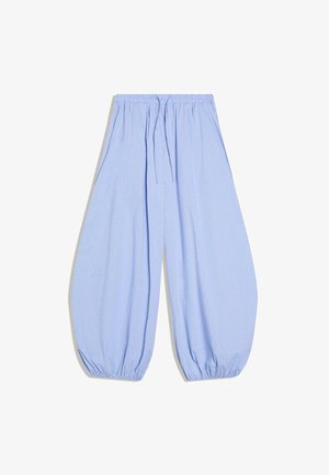 Jasnoniebieskie luźne spodnie z elastycznym paskiem i ściągaczami przy kostkach, z delikatnym wzorem w kratę oraz sznurkiem w pasie.