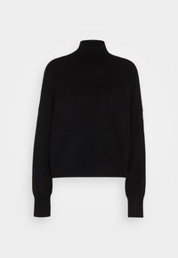 Zwarte coltrui met lange mouwen, gemaakt van zachte gebreide stof. Heeft een ontspannen pasvorm en geribbelde zoom en manchetten.