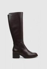 Brown leather knee-high boot with a square toe and block heel. Features a smooth texture and elastic side panel for a fitted look.