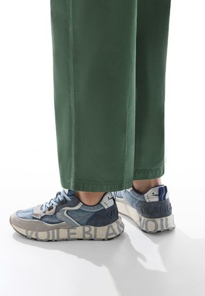 Blue and grey sneakers with textured denim and suede sections, featuring a prominent "VOILE BLANCHE" logo on the sole and back.