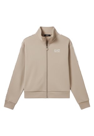 Chaqueta beige con cremallera completa, cuello alzado, logo EA7 en el pecho y rayas blancas con patrón a lo largo de las mangas.