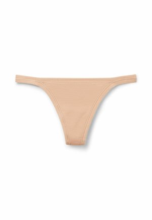 Naakte stringonderbroek van zacht, glad materiaal met dunne zijkanten en minimale bedekking. Eenvoudig ontwerp zonder zichtbare patronen of versieringen.