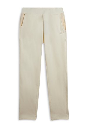 Pantalones beige de pierna recta con cintura elástica, bolsillos laterales con forro interior texturizado y pequeño logo metálico en el bolsillo derecho.