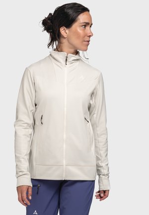 Light beige zip-up jacket made from textured fabric, featuring a high collar, two zippered side pockets, and a fitted design.