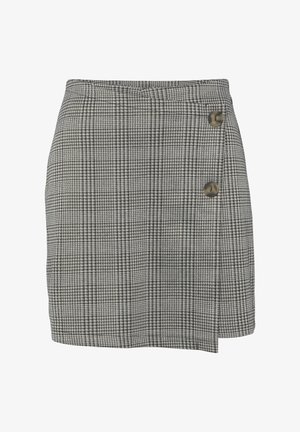 Geruite wikkelrok in zwart en wit, met een lichte textuur, twee decoratieve knopen aan de zijkant en een asymmetrische zoom.