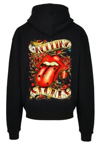 Schwarzer Hoodie mit einem mehrfarbigen Grafikdesign von roten Lippen mit einer Zunge, umgeben von Rosen, Herzen und Sternen. Text liest "Rolling Stones."