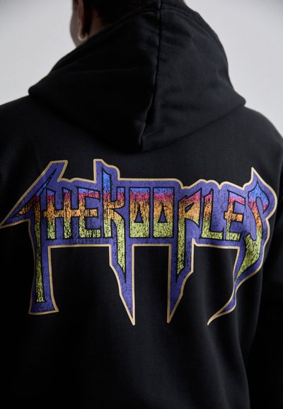 Hanorac negru cu un design grafic mare, multicolor, având textul "THE KOOPLES". Textul are un aspect texturat cu accente aurii.