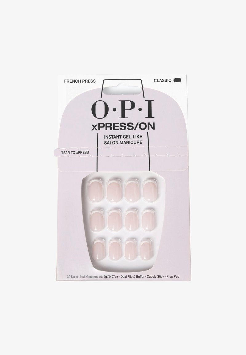 Des ongles autocollants roses dans un paquet, avec une finition lisse. Comprend 30 ongles, de la colle à ongles, une lime double face, un polissoir, un bâton de cuticule et un pad de préparation.