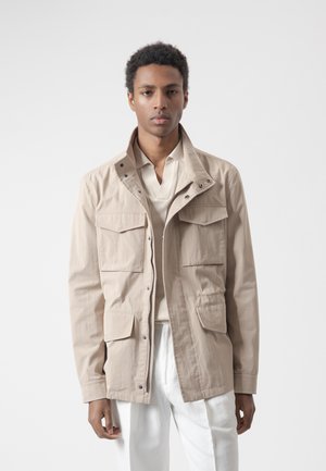 PuroEgo, Chaqueta de entretiempo - arena