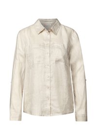 Camicia a maniche lunghe beige chiaro con colletto button-down, due tasche sul petto e maniche arrotolabili, realizzata in un morbido tessuto testurizzato.