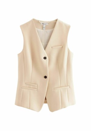 Gilet beige sans manches cintré avec deux boutons sur le devant et trois poches passepoilées sur fond blanc.