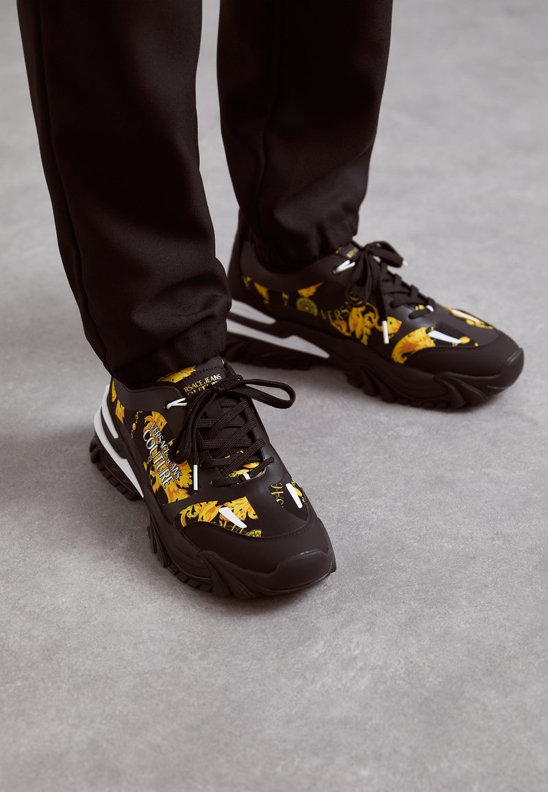 versace couture jeans sneakers