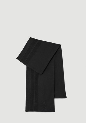 Black scarf made from soft fabric, featuring a ribbed texture and subtle logo detail at one end. Rectangular shape with clean lines.