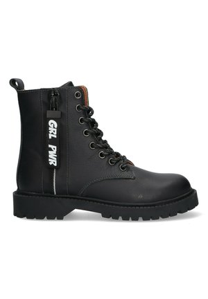 Black leather ankle boot with lace-up front and side zipper, featuring a "GRL PWR" tag. Thick rubber sole with textured tread detail.