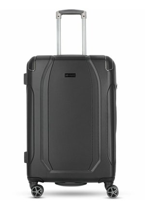 Black hard-shell suitcase with textured surface, retractable handle, and four wheels. Features a logo and streamlined design for durability.