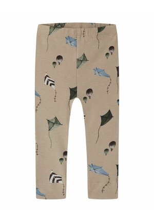 Leggings beige pour tout-petits avec des cerfs-volants et montgolfières imprimés en bleu, vert, noir et blanc.