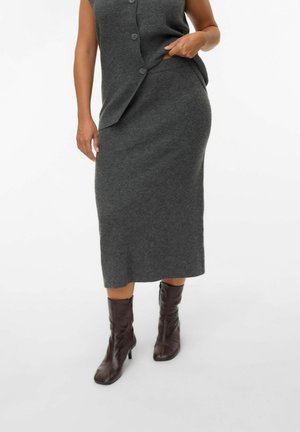 Gray wool blend two-piece outfit featuring a buttoned sleeveless top and a matching midi skirt, paired with brown ankle boots.