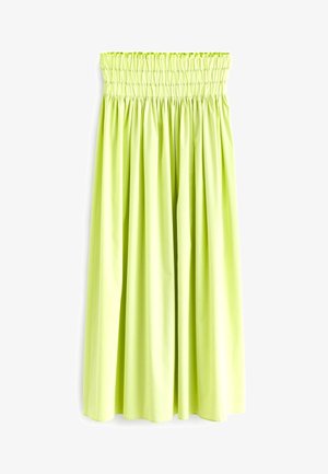 Jupe taille haute vert clair avec ceinture élastique froncée et plis doux descendant jusqu'à un ourlet mi-long.
