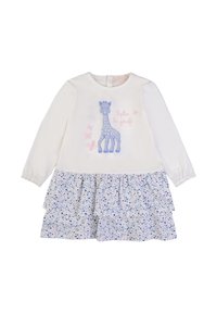 Abito a maniche lunghe con parte superiore bianca decorata con una grafica di una giraffa blu e testo rosa, e una gonna a strati con un motivo floreale blu.