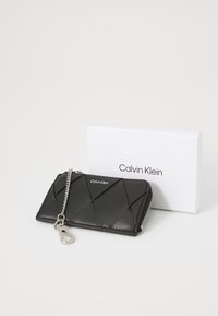 Calvin Klein ZIP AROUND CARDHOLDER - Wallet - black