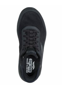 Black sneaker with a mesh upper, lace-up design, and a cushioned sole. Features logo on the tongue and side, with a sleek, textured finish.