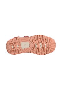 Pink rubber shoe sole with textured grip pattern, featuring a light beige accent in the center and multi-directional grooves for traction.